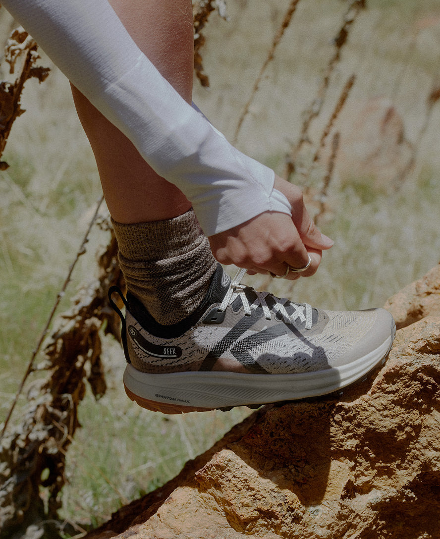 Keen Online | Women's Seek Trail Running Shoe Black/Sunset Sand